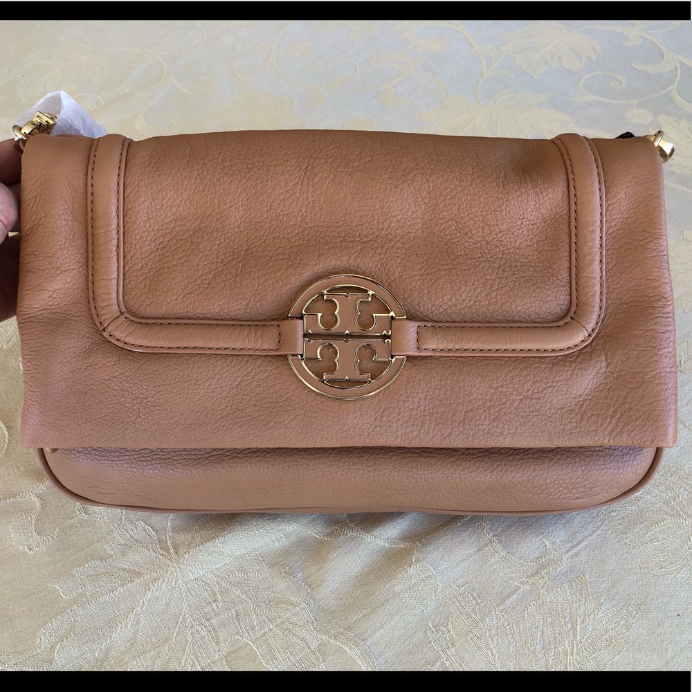 Brown/camel colored leather Tory Burch handbag with gold hardware